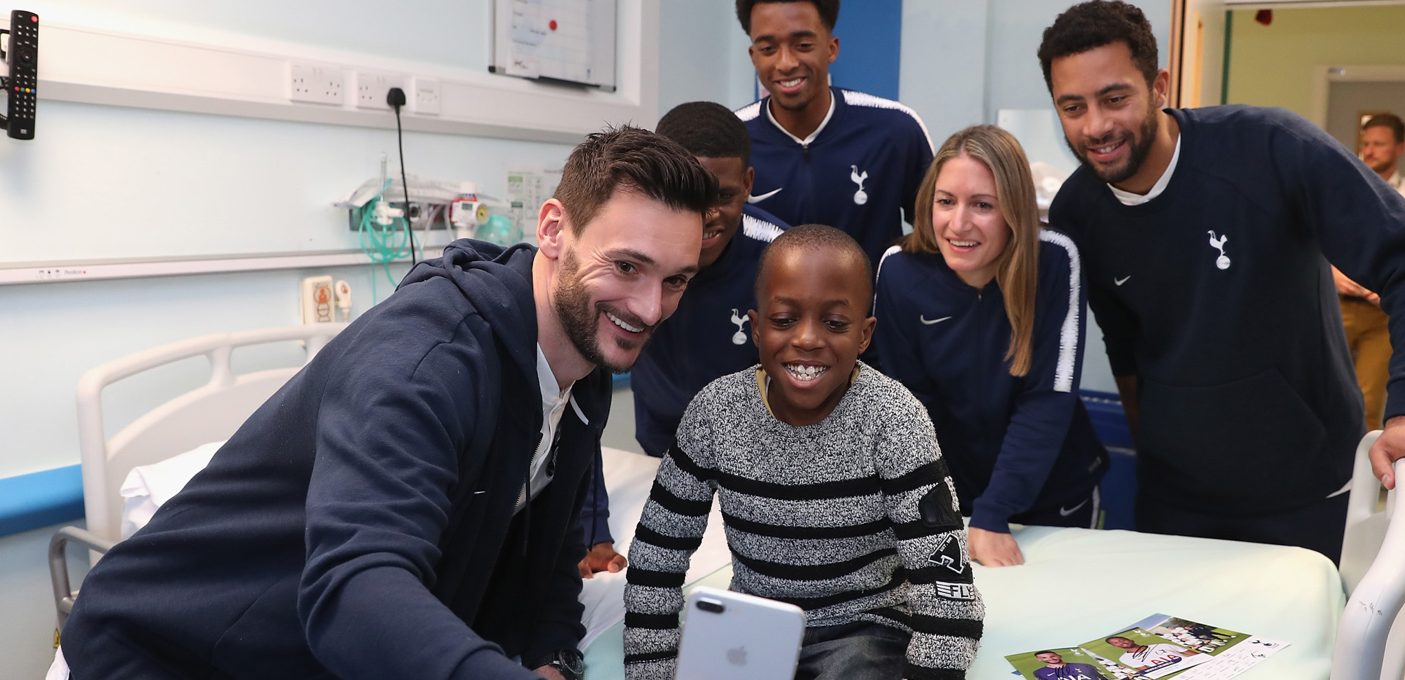 Players bring festive cheer to local children's wards
