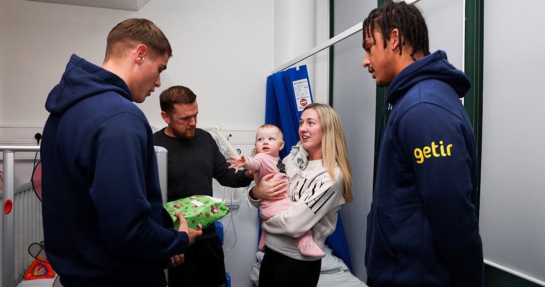 Players spread festive cheer with visits to five local children’s wards