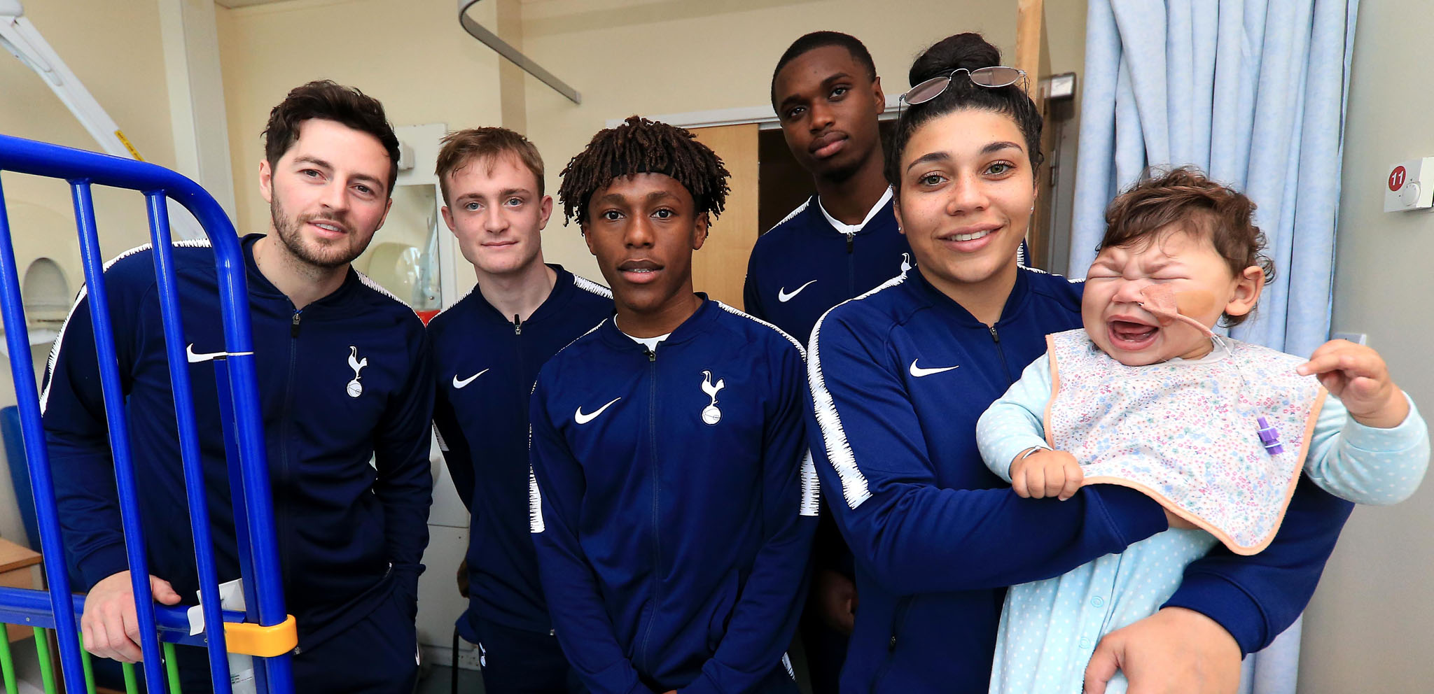 Players bring festive cheer to local children's wards