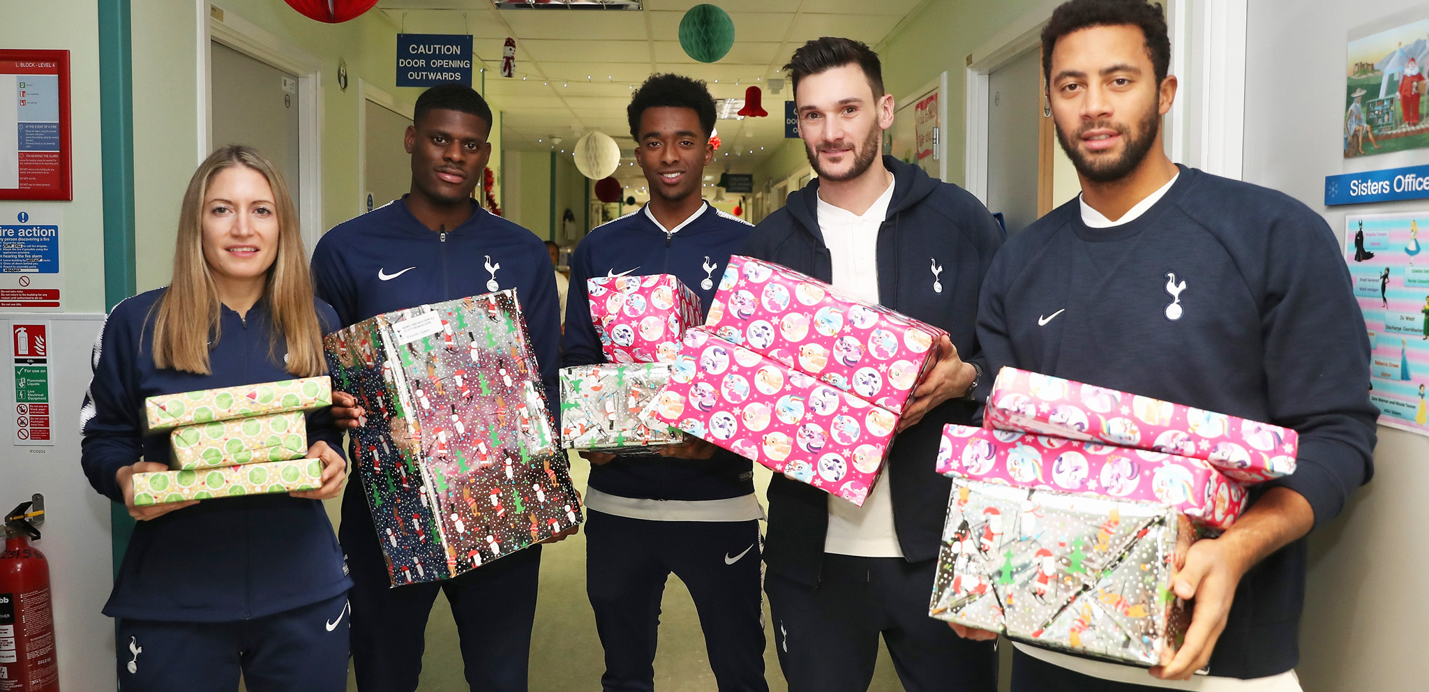 Players bring festive cheer to local children's wards