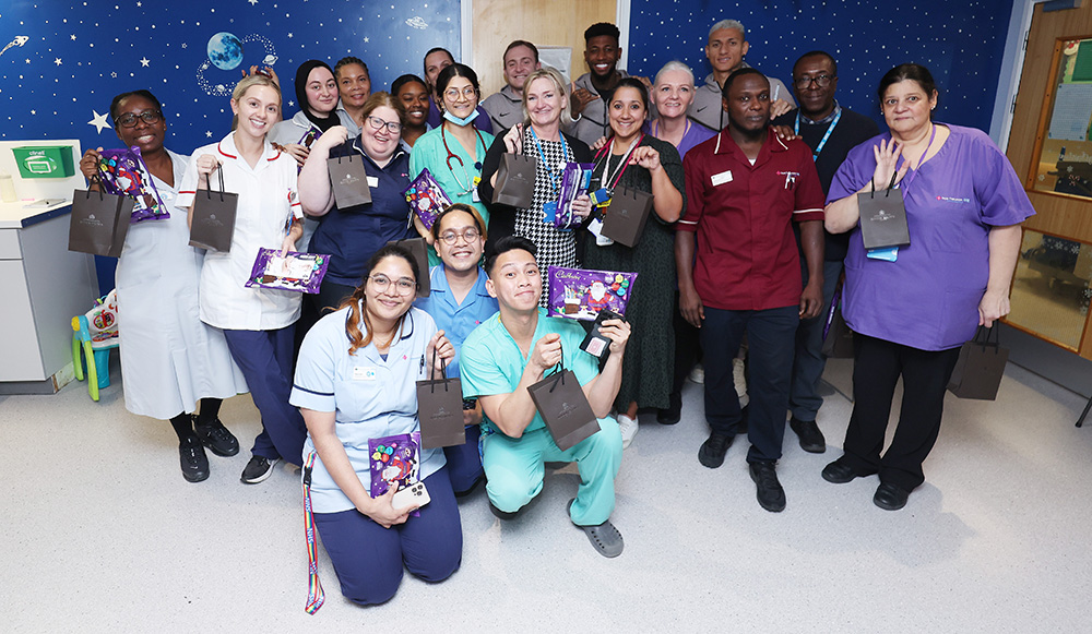 Players spread festive cheer with visits to five local children’s wards