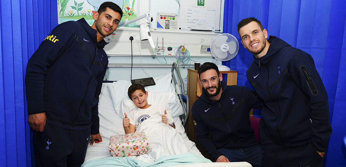 Players spread festive cheer with visits to five local children’s wards