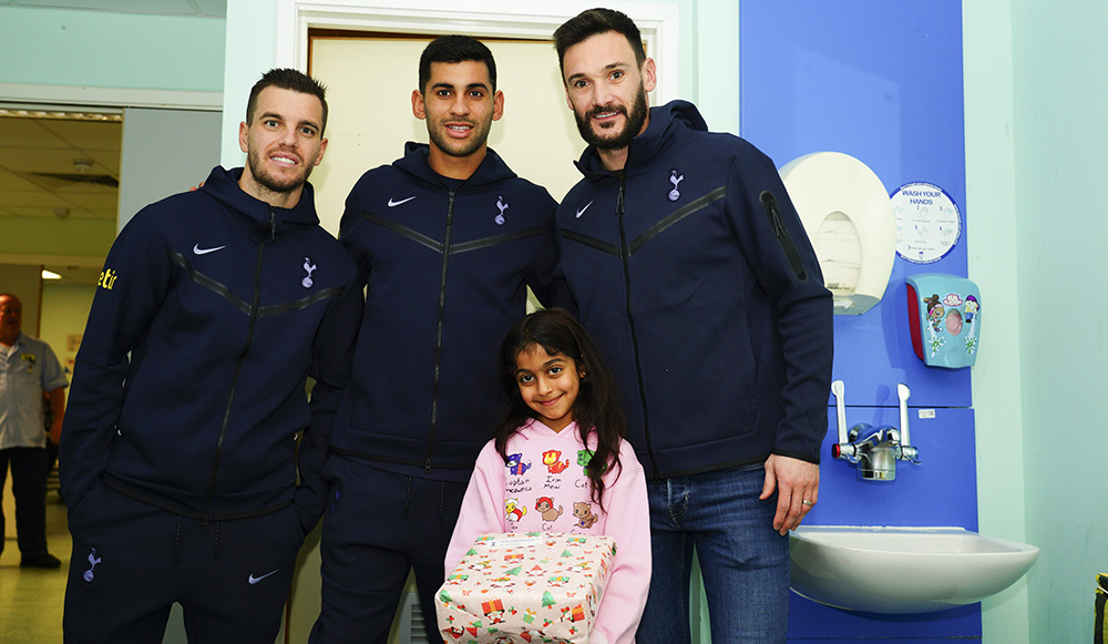 Players spread festive cheer with visits to five local children’s wards