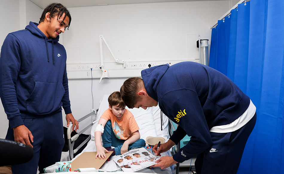Players spread festive cheer with visits to five local children’s wards