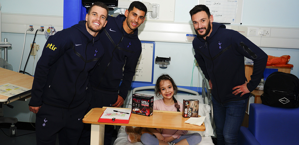 Players spread festive cheer with visits to five local children’s wards