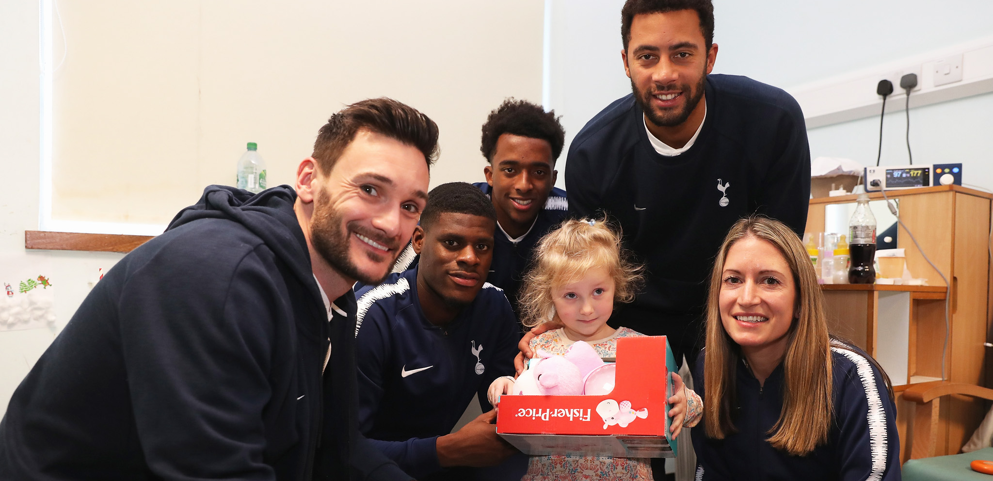 Players bring festive cheer to local children's wards
