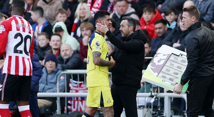 Cuti Romero is consoled by Roberto De Zerbi after his injury at Sunderland