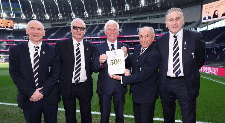 Jimmy Holmes receives his Legacy certificate from Paul Allen, Phil Beal, Ossie Ardiles and Mark Falco