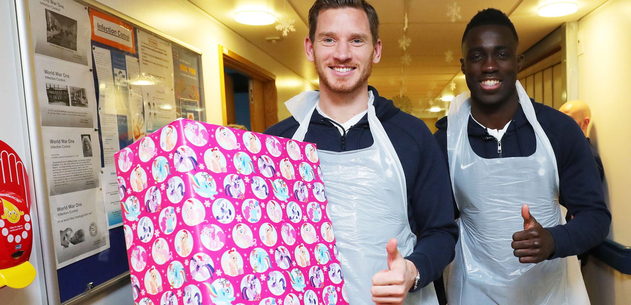 Players bring festive cheer to local children's wards