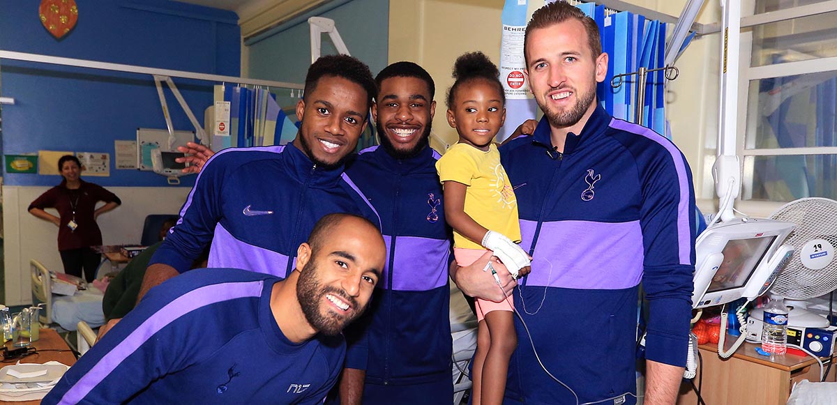 Players spread festive cheer with visit to local children’s wards